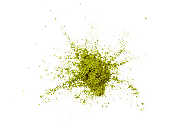 istock Green matcha tea powder explosion,white background 1202223213