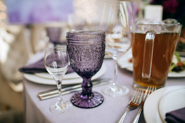 istock elegant table setting in purple color on the wedding party 1202223359