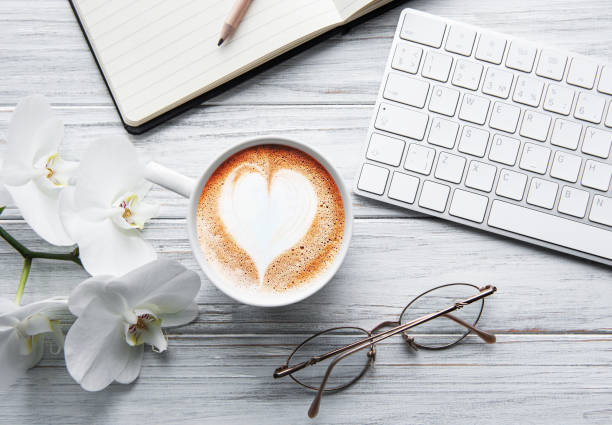 istock A cup of coffee with heart pattern on a table 1202226306