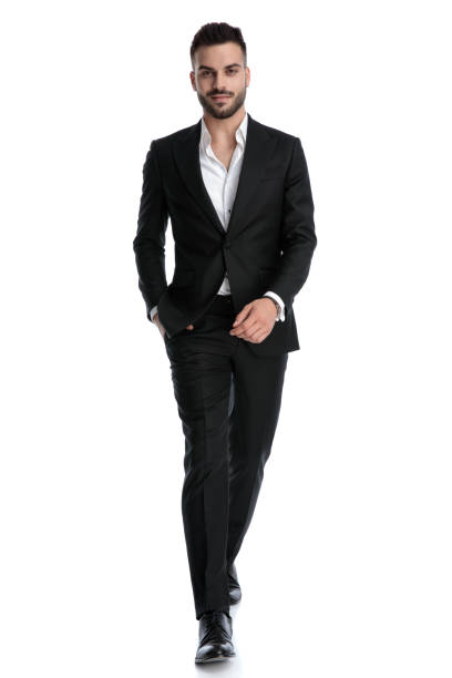 istock businessman walking with hand in pocket delighted 1202226665