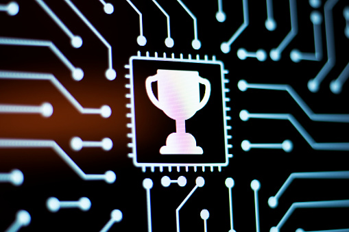 Technology Background and Circuit Board With Trophy Award icon. Close-Up Computer Screen Concept. Horizontal composition.