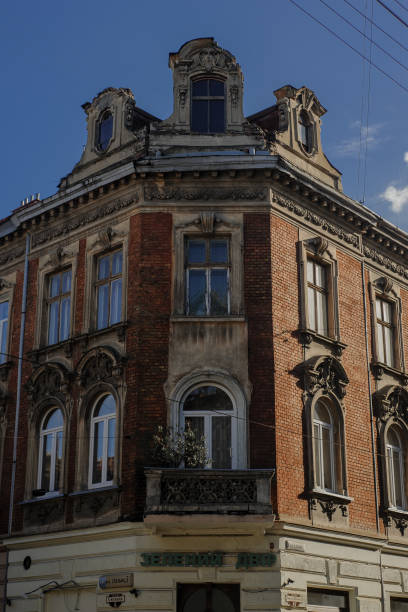 istock Building facade. Old building exterior with windows and lanterns. Historic building structure. Architectural structure. Urban architecture and construction. City building. Town house. 1202232104