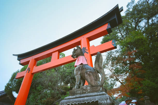 Kyoto, Japan - December 17, 2019 : Fox statue in Fushimi Inari Taisha shrine, Kyoto, Japan.