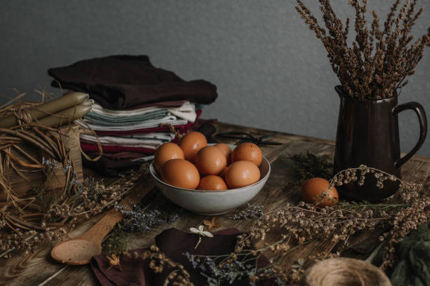 istock Design of Easter eggs in a rustic style on a wooden table 1202233372