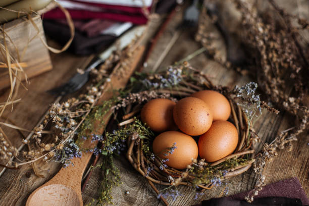 istock Design of Easter eggs in a rustic style on a wooden table 1202233379