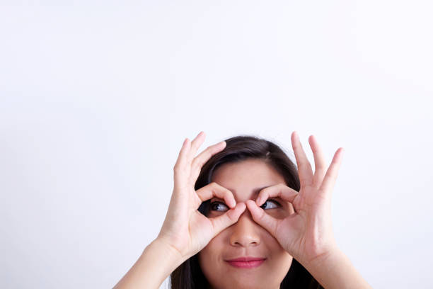 happy chinese ethnicity women with hand sign ok