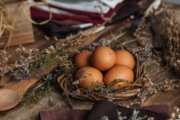istock Design of Easter eggs in a rustic style on a wooden table 1202233417