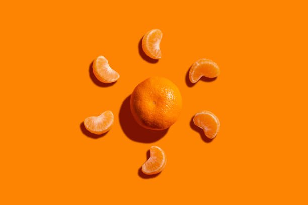 Tangerine surrounded by slices