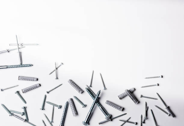 istock Screws and plugs of different kinds on a white background 1202235582