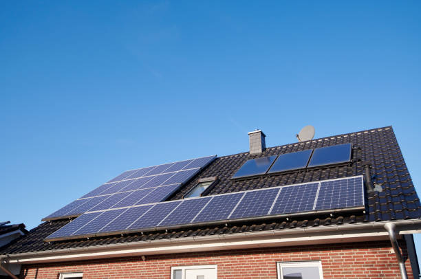 istock New basic house with solar panels on the roof 1202236387
