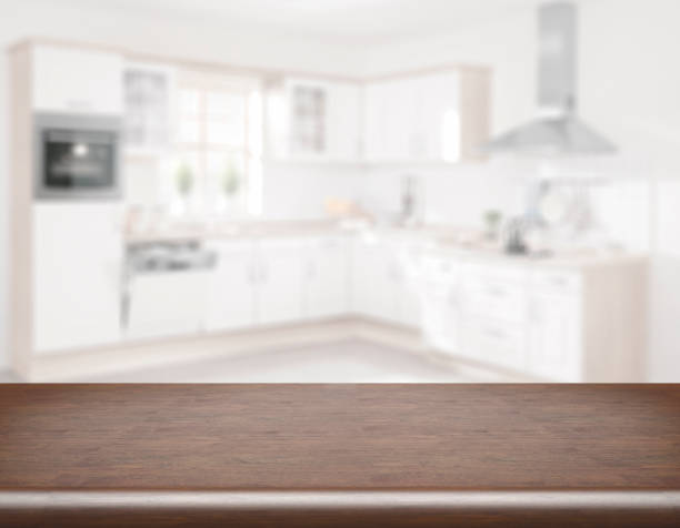 istock clear table top in front of blurry kitchen 1202239317