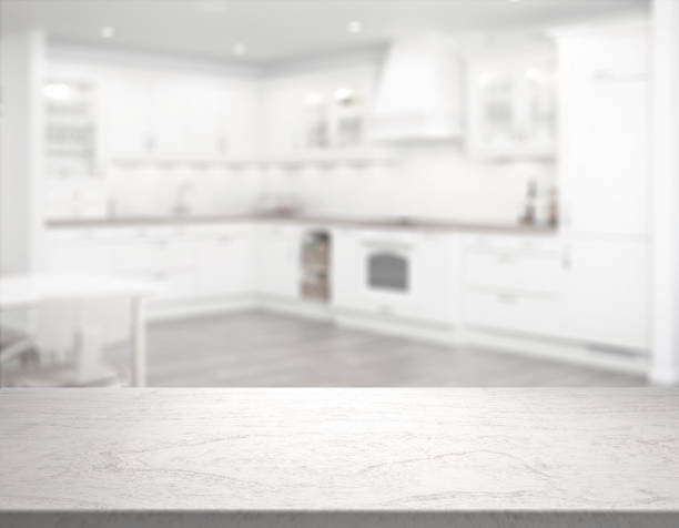 istock clear table top in front of blurry kitchen 1202239848