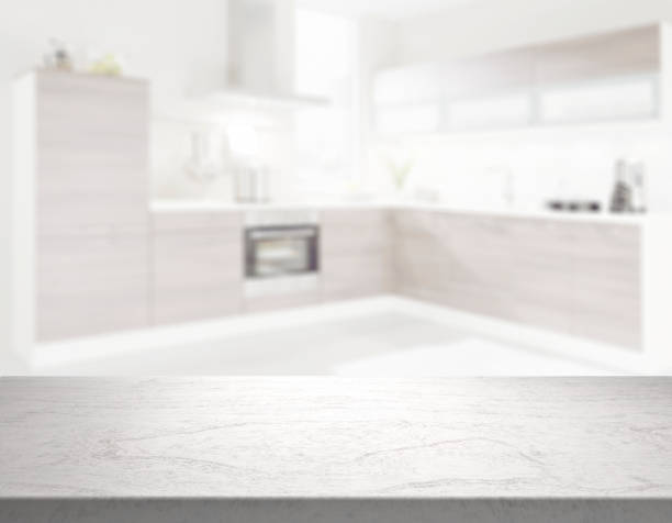 istock clear table top in front of blurry kitchen 1202239861