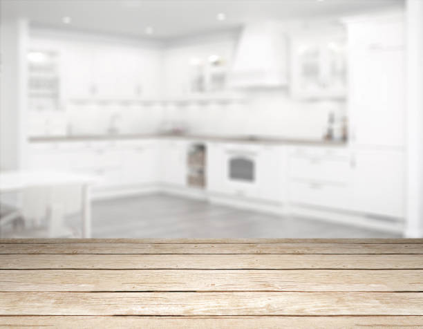 istock clear table top in front of blurry kitchen 1202239950