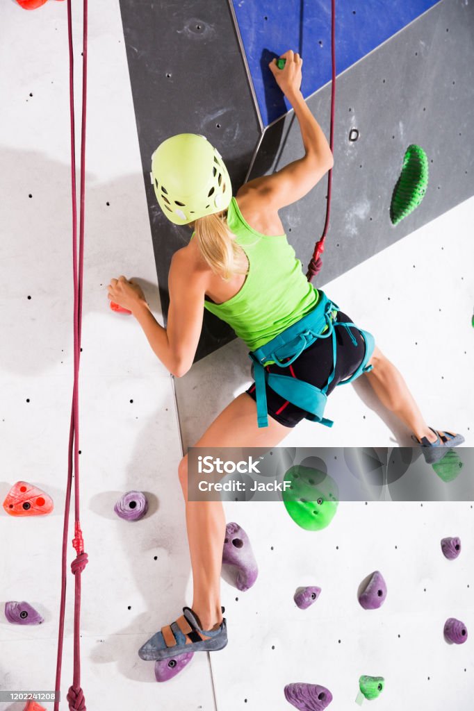 Woman Dressed In Rock Climbing Outfit Training Stock Photo - Download Image  Now - Relocation, Adult, Adults Only - iStock