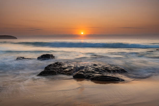 istock Pretty Pastel Summer Sunrise by the Sea 1202242556
