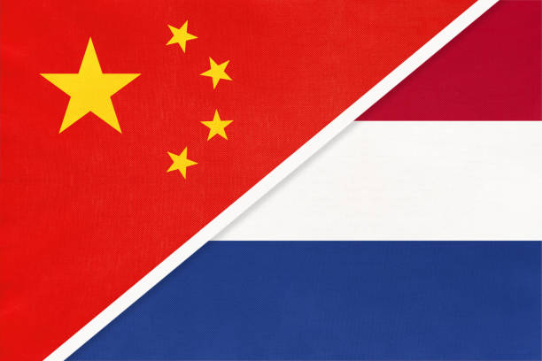 istock China or PRC vs Netherlands or Holland national flag from textile. Relationship between asian and european countries. 1202242634