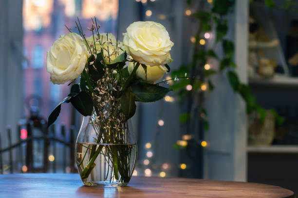 istock Bouquet in a vase on the table 1202242655