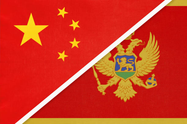 istock China or PRC vs Montenegro national flag from textile. Relationship between asian and european countries. 1202242805