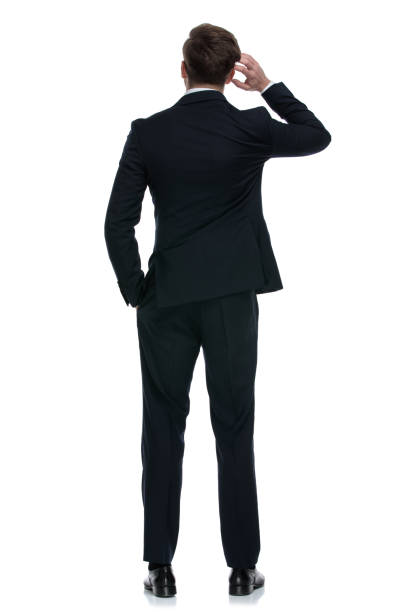 istock elegant businessman in suit scratching head and thinking 1202242905