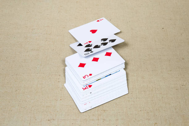 istock Shifted deck of playing cards on the cloth surface 1202245048