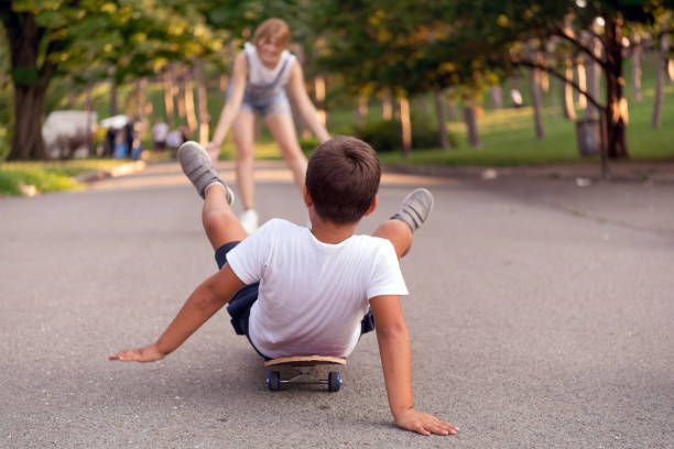istock Mom and son in park having fun 1202246370