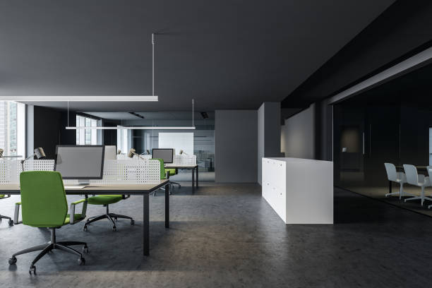 istock Gray and green corporate open space office 1202246459