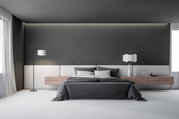istock Gray master bedroom interior with lamp 1202248047