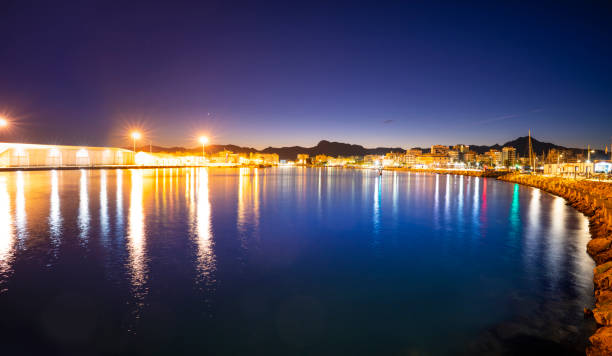 moonlight at night over the sea, reflection. horizon blue sky with clouds. a picture on a long time. Beautiful landscape.