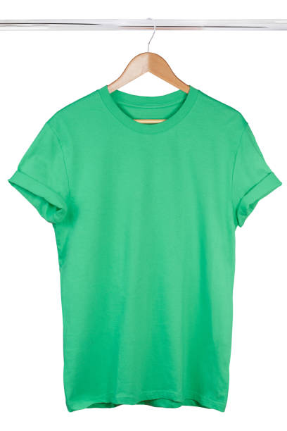 istock Green t-shirt on hanger isolated on white background 1202250638