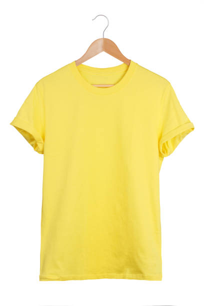 istock Blank yellow t-shirt on hanger isolated on white background 1202250662