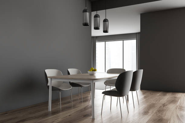 istock Corner of gray dining room with lamps 1202252968