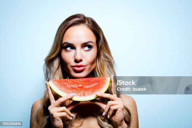 Summer Portrait Of Young Blonde Woman Holding Watermelon Stock Photo - Download Image Now