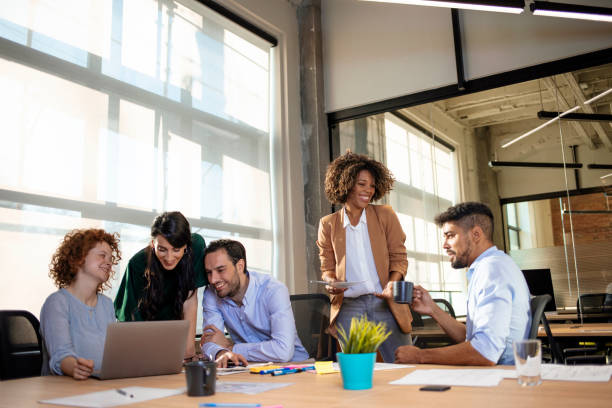 istock Group of multi ethnic executives discussing during a meeting 1202255735