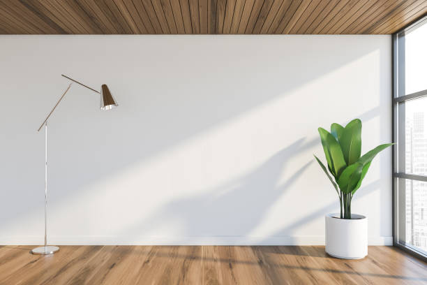 istock Empty white living room with lamp 1202255925