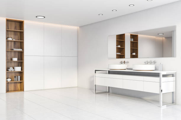 istock Wood and white bathroom corner with double sink 1202256104