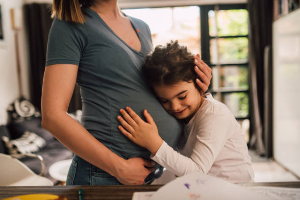 istock Waiting for her little brother 1202257462