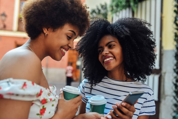 istock Friends on a coffee break using a smartphone 1202257463