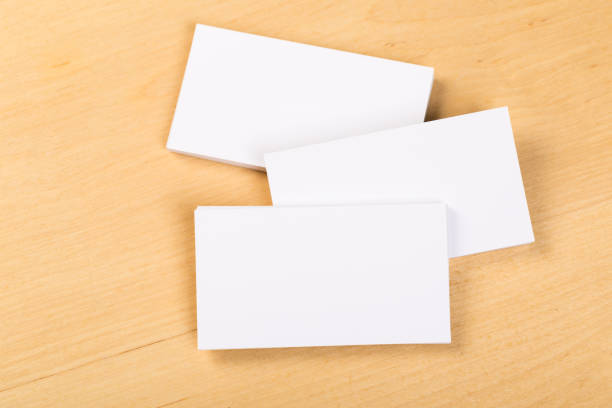 istock mock up  blank business cards on a general background. Template for identifier. View from above. 1202259152