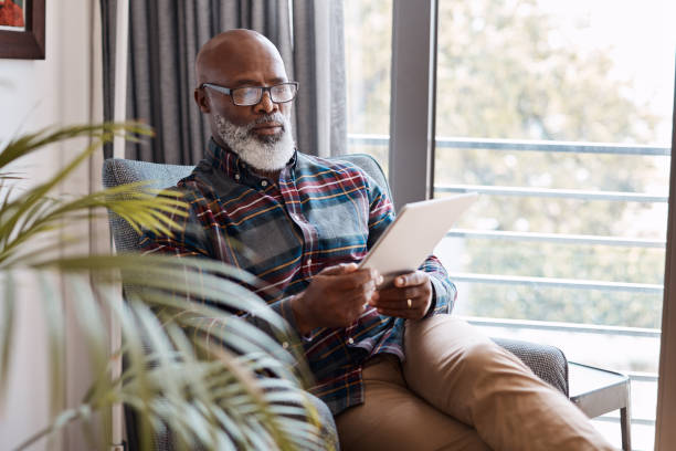 istock Downloading a few new ebooks to read 1202259214
