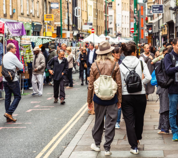 London, UK - People visiting London's Brick Lane markets at the weekend.