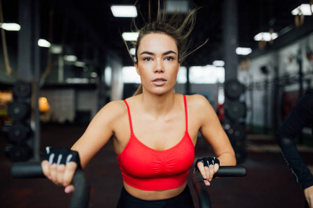 istock Young woman in a gym 1202261381