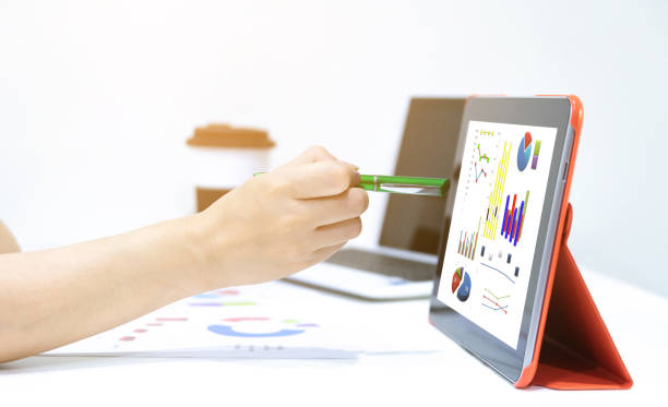 istock Graph analysis with the company's successful business tablets. 1202262641