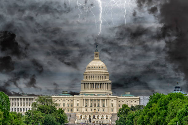 istock Washington DC Capitol from the mall on cloudy sky background 1202262865