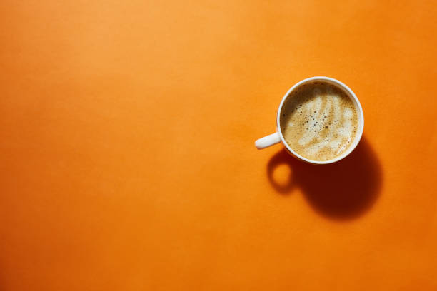 istock Coffee with cream foam. top view, minimalism. bright background. 1202269315