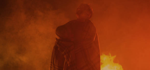 istock Boy and girl trapped in fire crying for help 1202269530