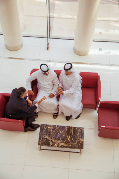 istock Three Arab business men doing business 1202269750