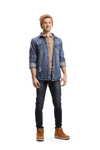 istock Guy in jeans and a woolen hat looking at the camera 1202269799