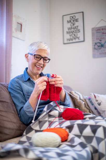 istock Making a warm scarf for the winter 1202271212