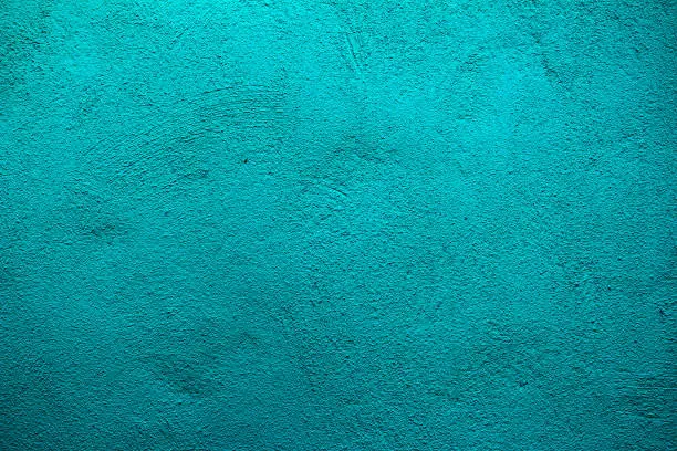 Aquamarine colored wall texture background with textures of different shades of aquamarine or turquoise